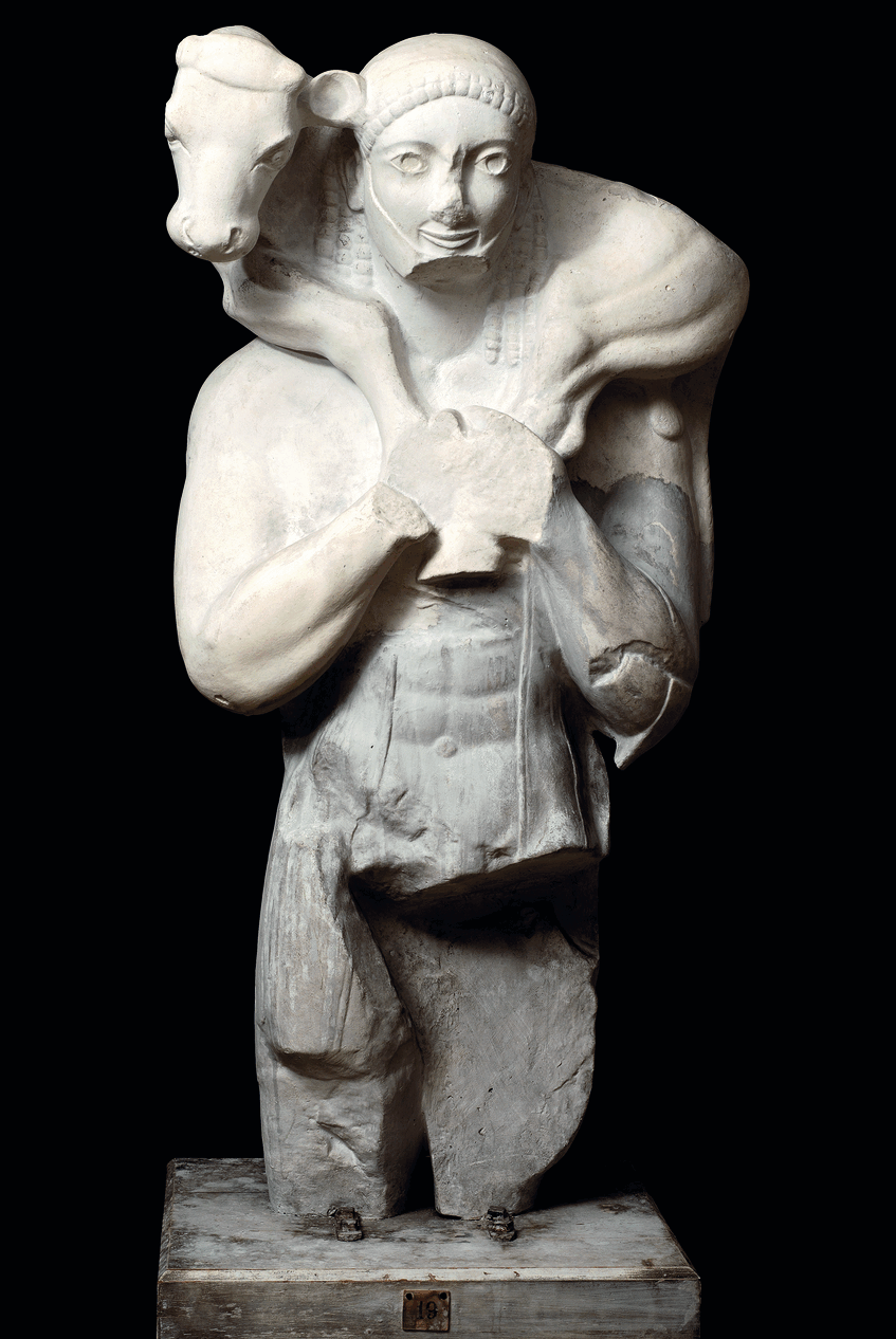 Das Bild zeigt den Gipsabguss einer Statue eines jungen Mannes, der auf seinen Schultern ein Kalb trägt. Das Foto verlinkt auf eine Unterseite, auf der die Statue, die Tierdarstellung und die Aufstellung als Weihgeschenk auf der Akropolis von Athen bespr